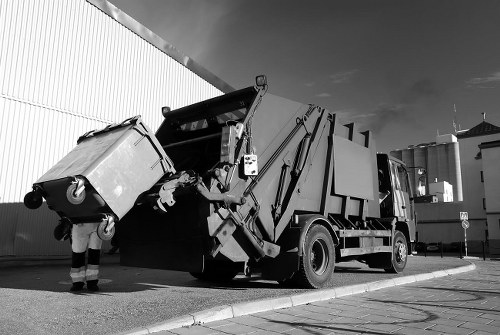 Builders skip being loaded with construction waste